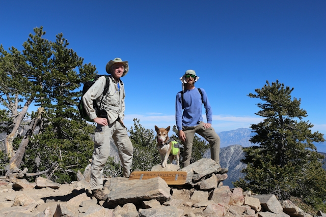 Me, my son, and his dog pose on the summit of San Bernardino Peak